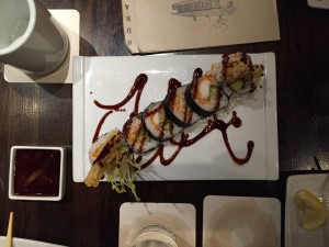 A photo of the delicious spider roll.  Artistic skills were needed to create this masterpiece.