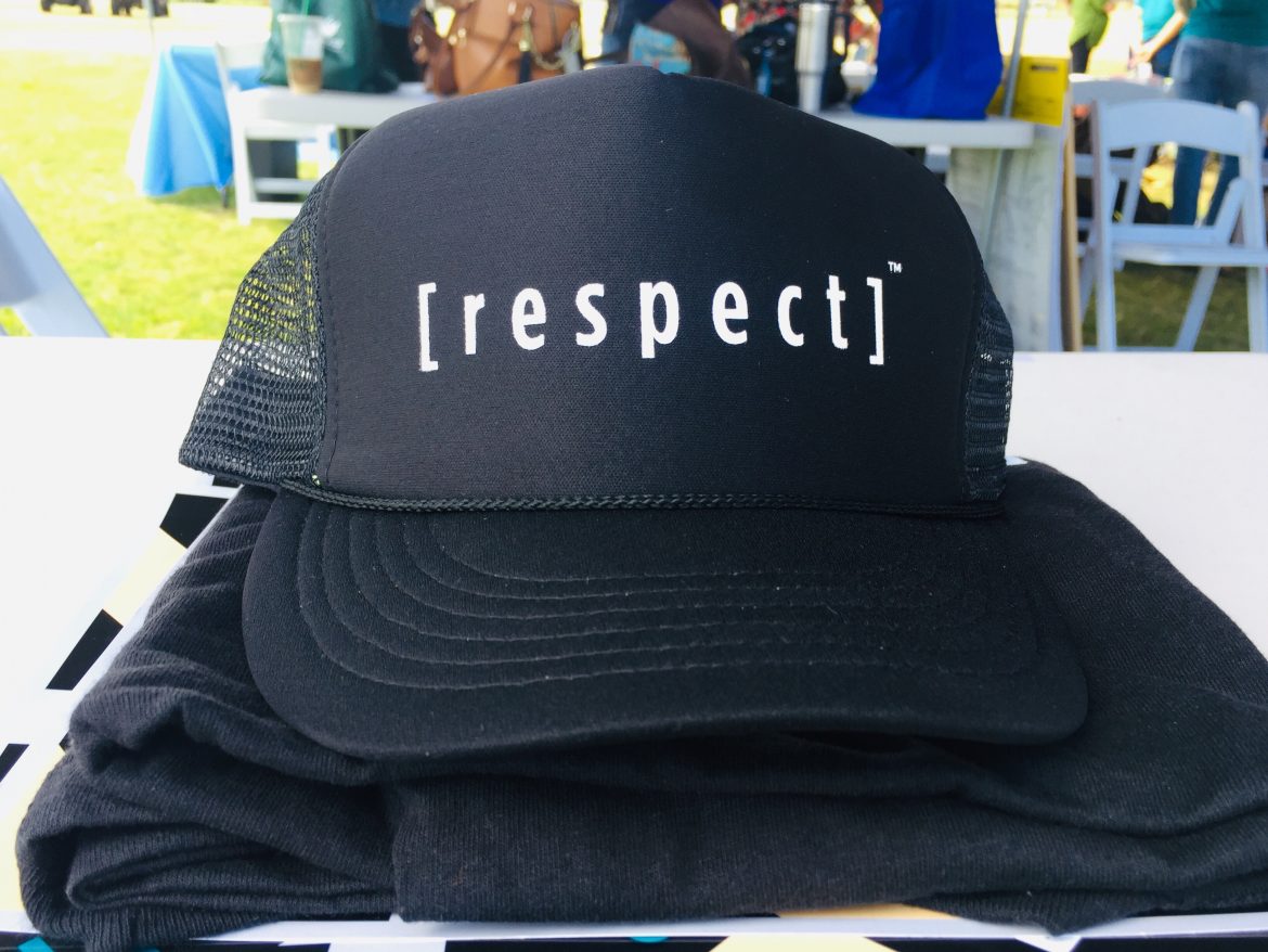 Black hat with the word "respect" on the front