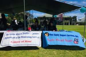 Two banners advertising local resources for those who have experienced sexual abuse.