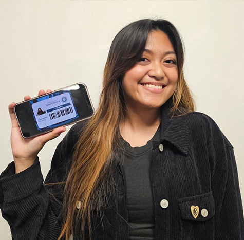 UHMC Student Holding Digital ID Card